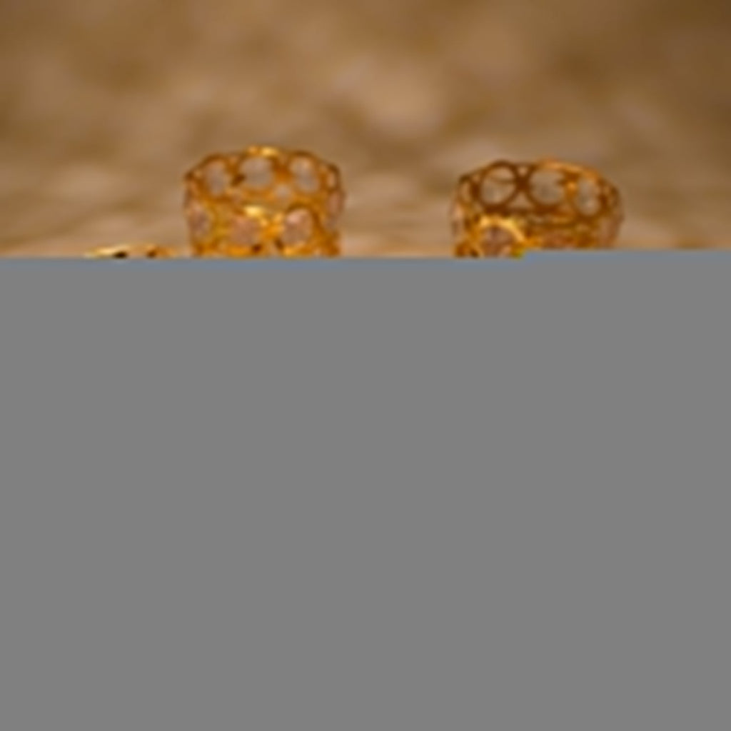 Two-line diamond jhoomer with mixed design.