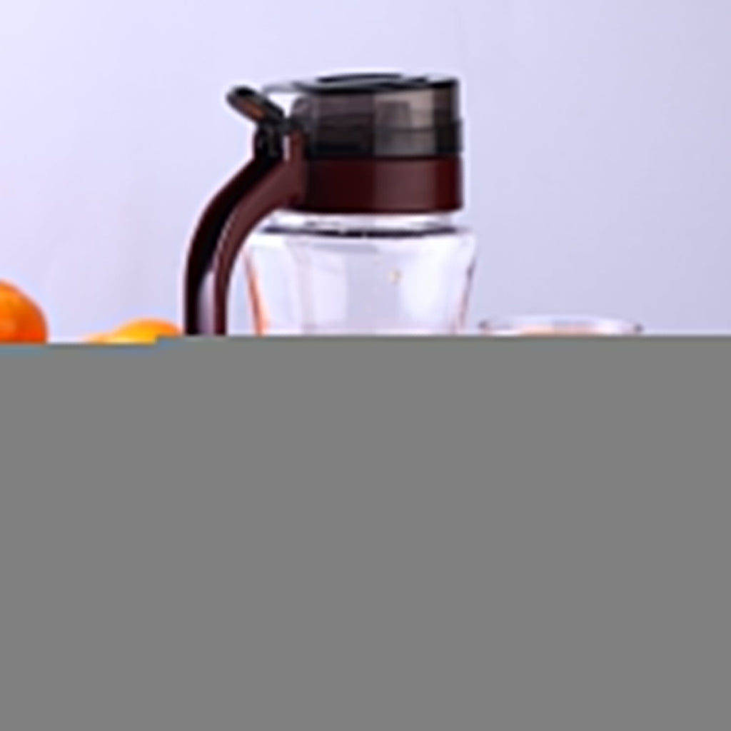 Stainless steel oil dispenser with small nozzle for controlled pouring